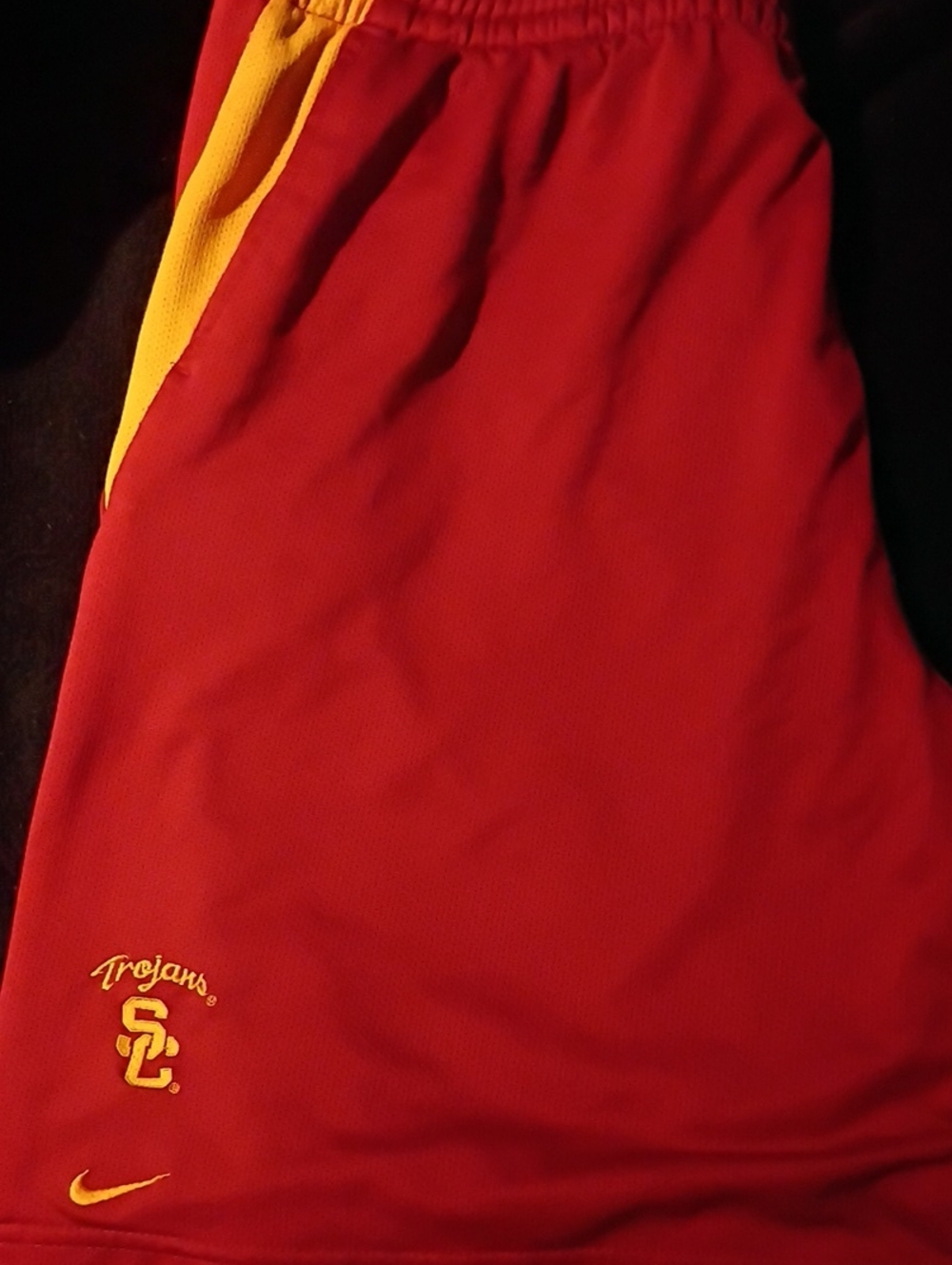 Nike Red Athletic Shorts with Yellow Trim and USC Trojans Logo